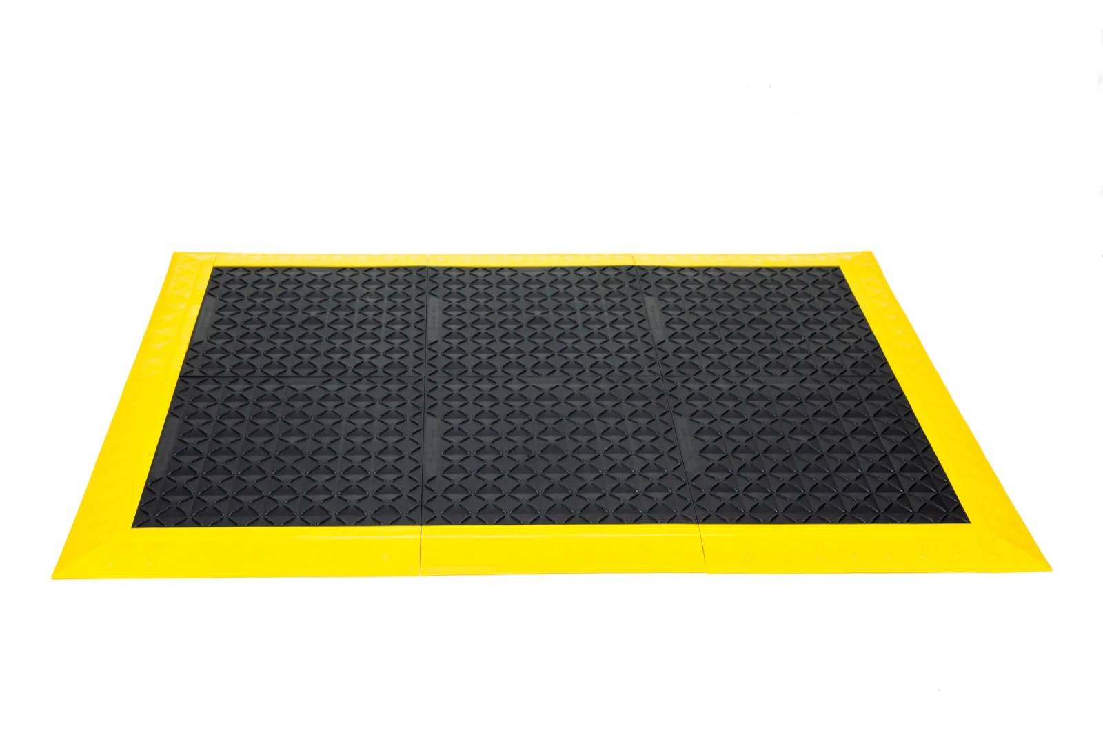 A black and yellow modular workstation matting kit.